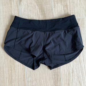 Lululemon size 4, 2.5” inseam black running shorts